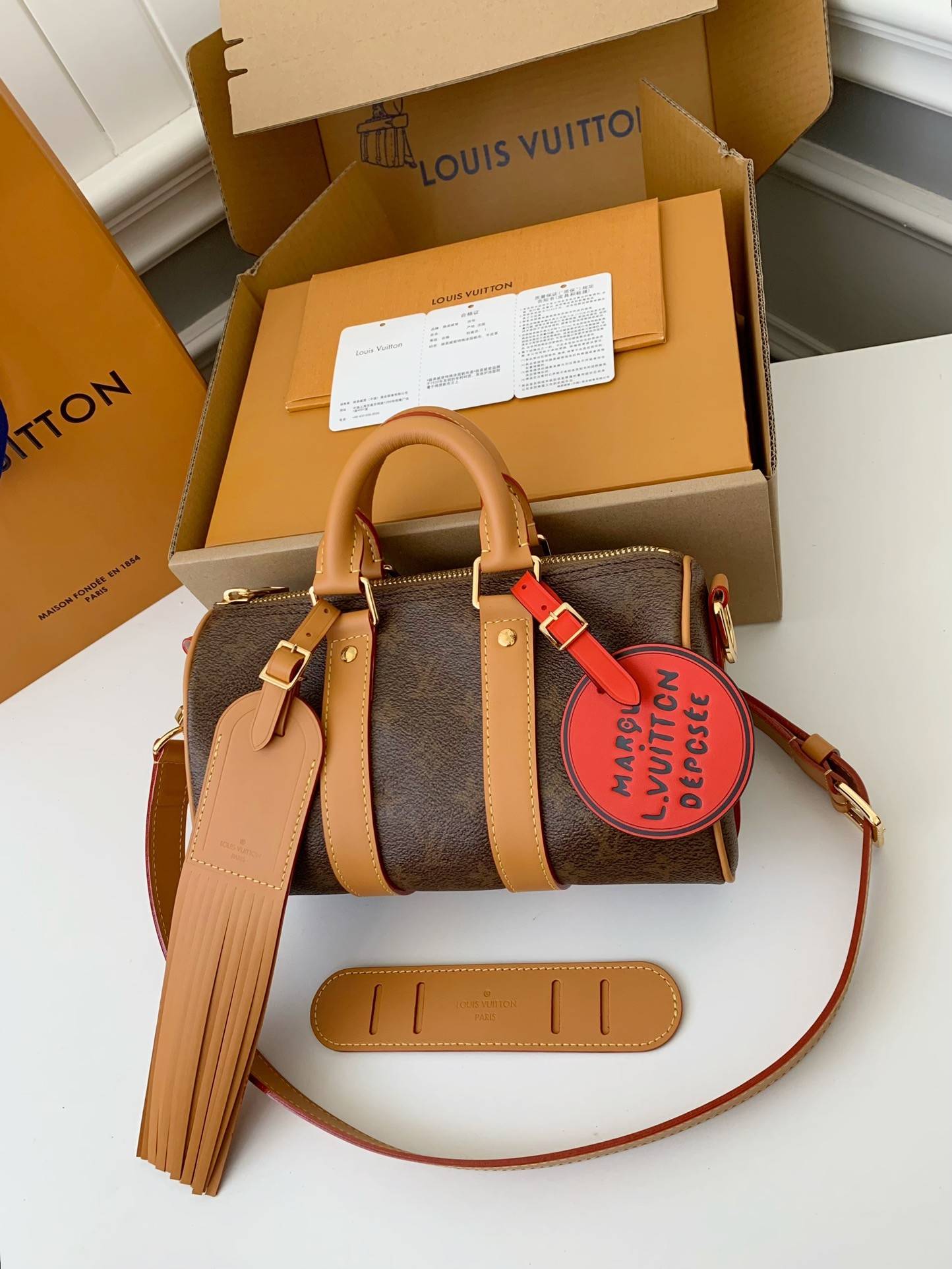 L*V The New Keepall Bandouli ère 25 handbag  M11542  Size：25*15*11cm