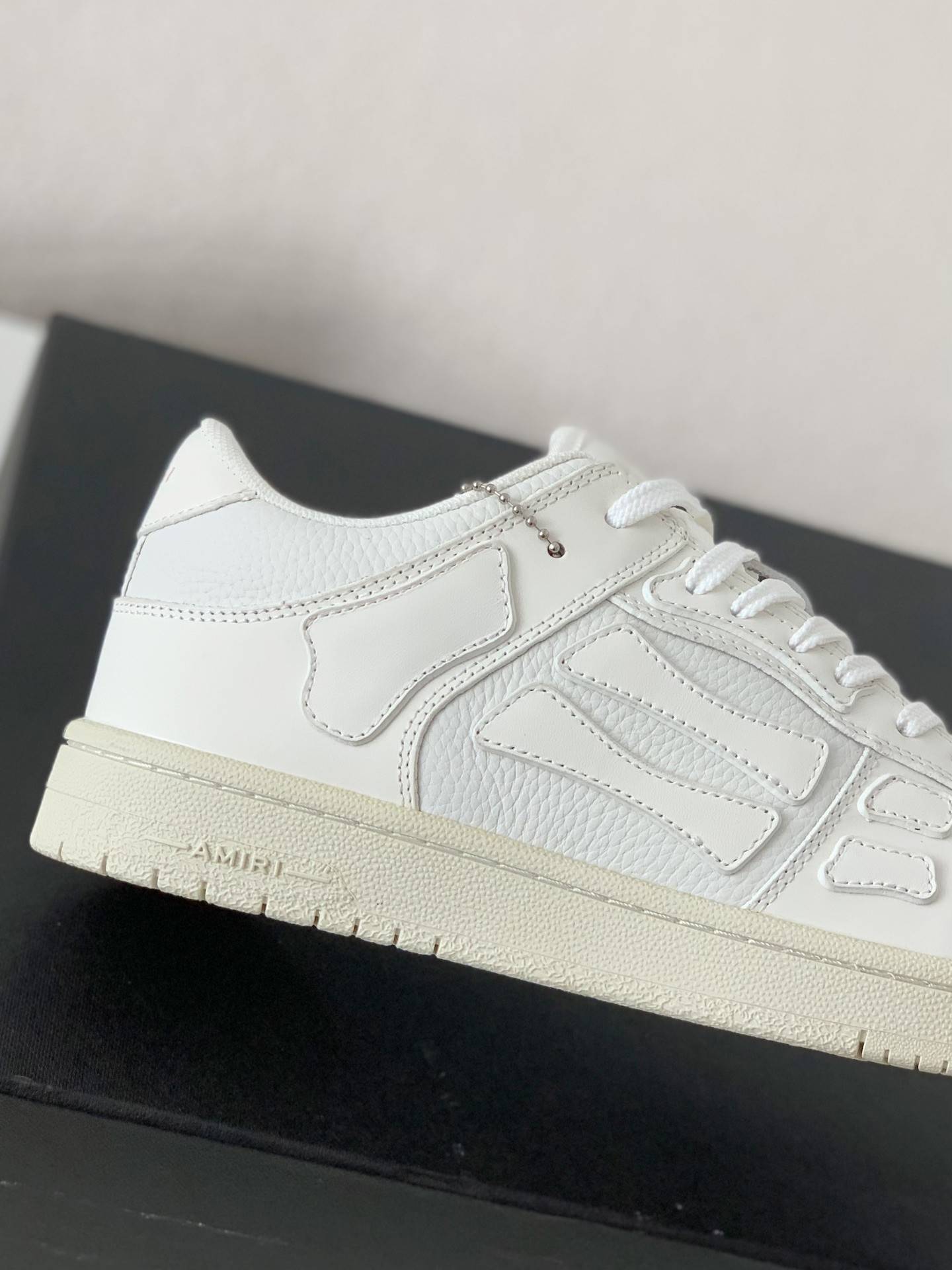 A*RI Bone Sneakers